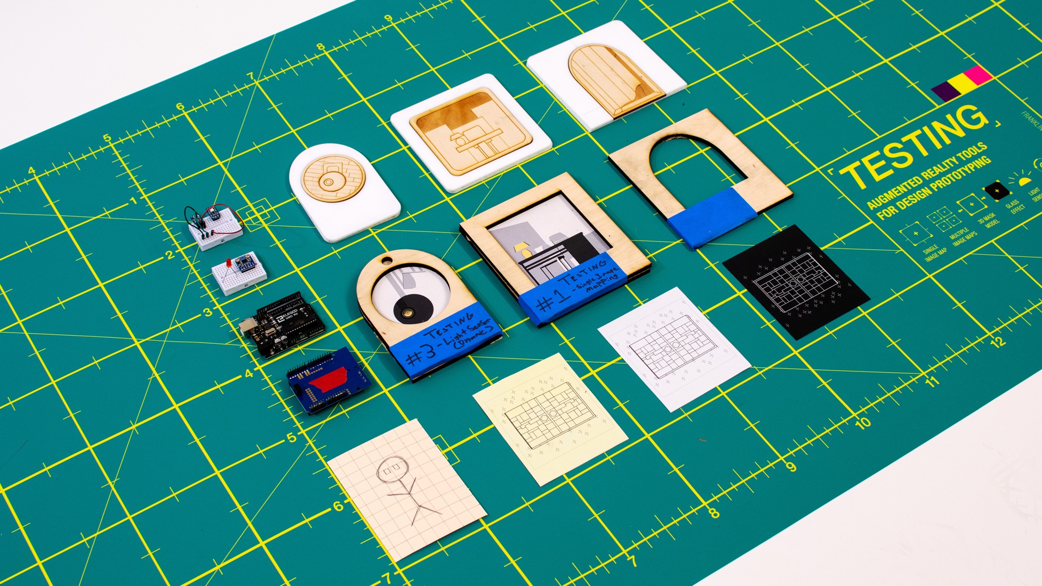 Range of image mapping card materials and finishes laid out — testing contrast, line weight, and tracking reliability