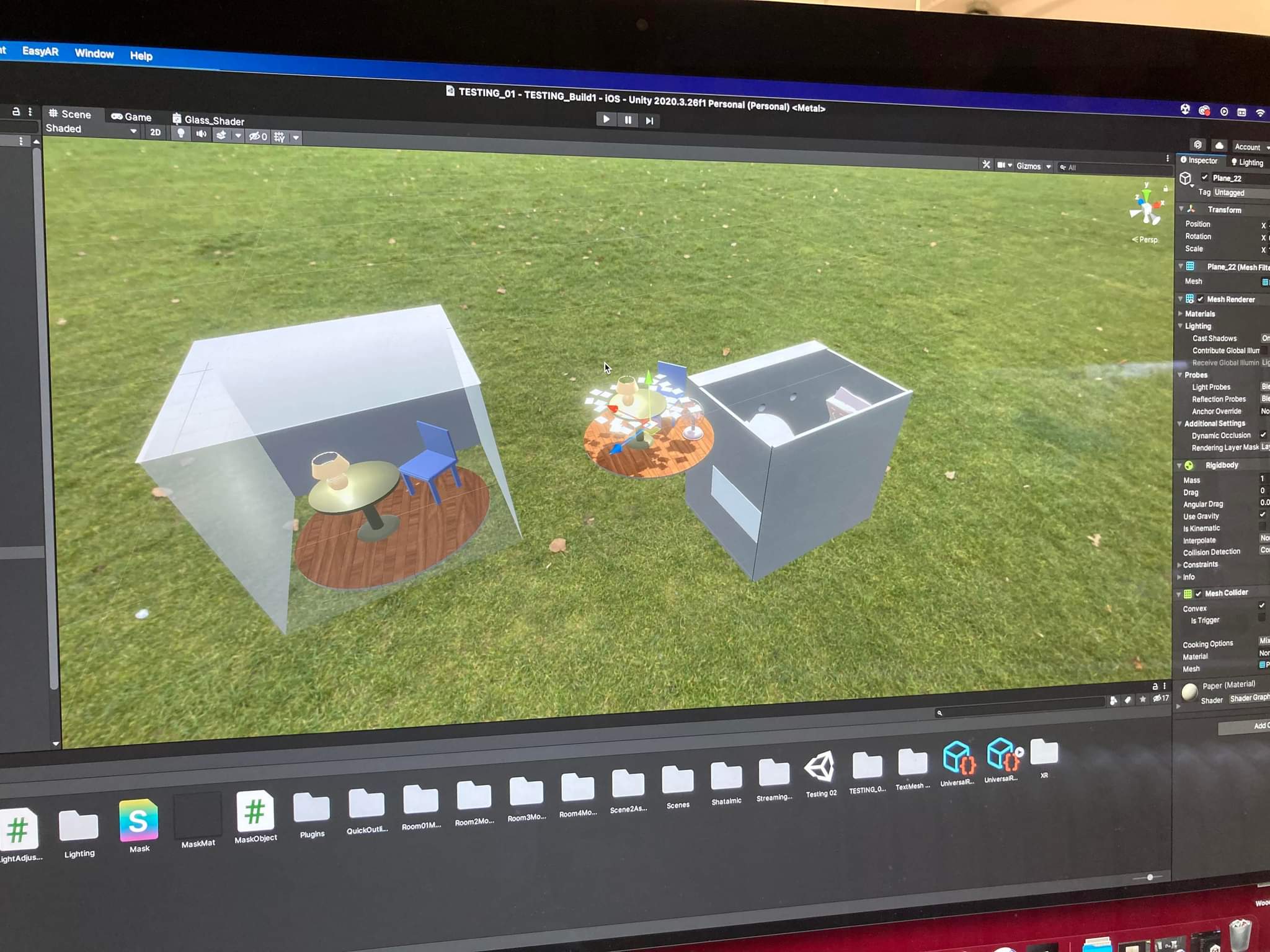 Unity editor: 3D masking prototype scenes positioned outdoors — testing virtual content at real-world scale