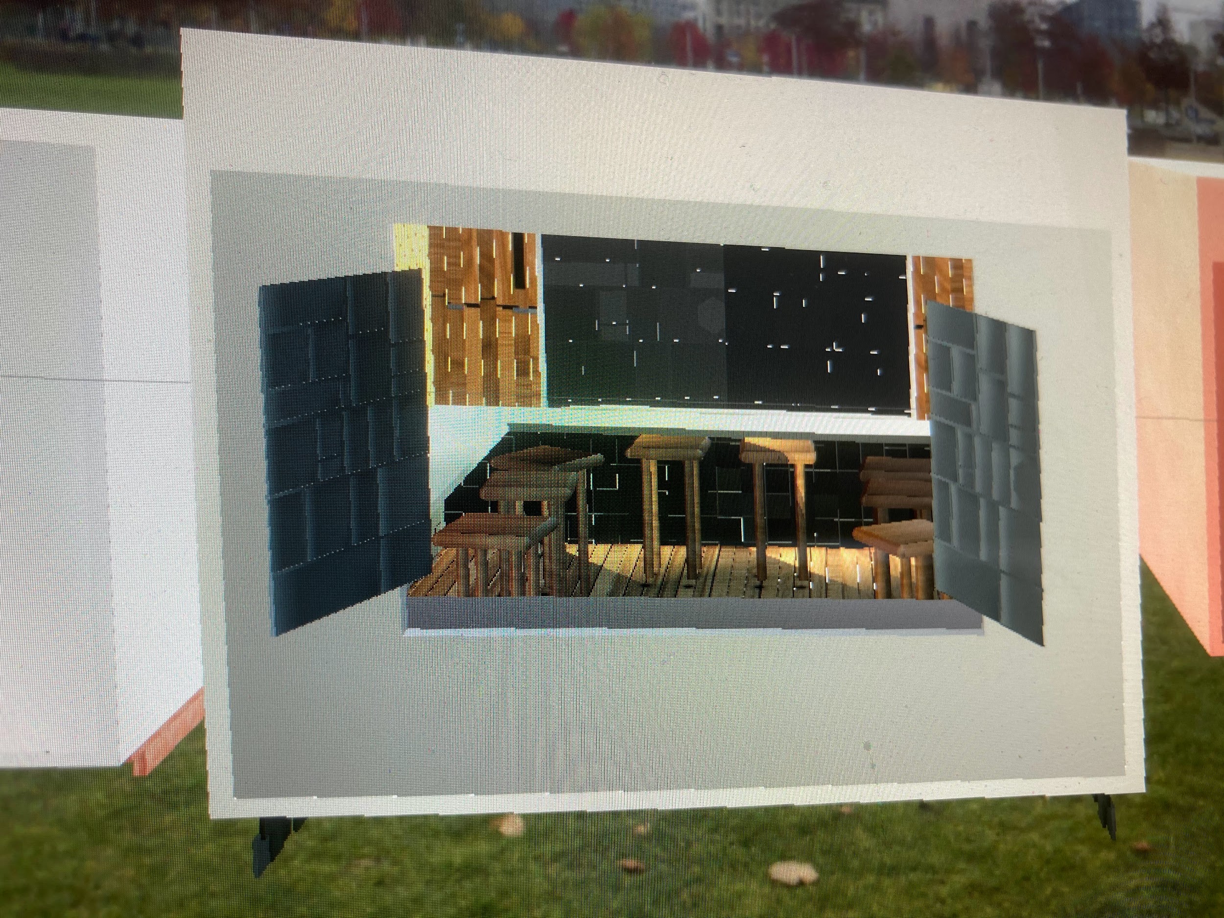 AR content visible through foam core box window outdoors — testing 3D masking at outdoor scale